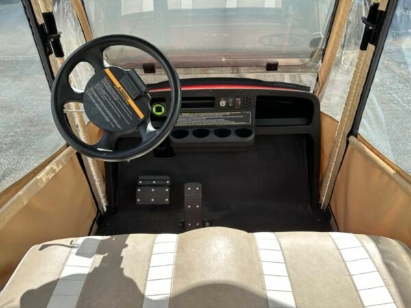 2014 EZGO TXT – 2 Passenger Electric Golf Cart (Pure Red)